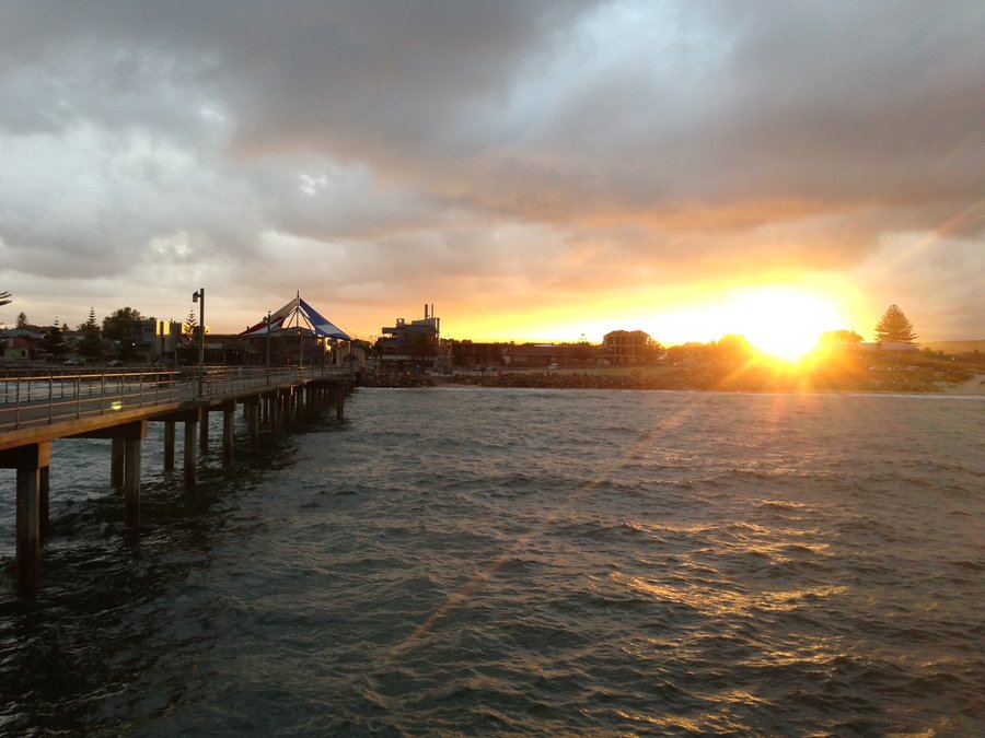 Fishing at Brighton pier at sunset